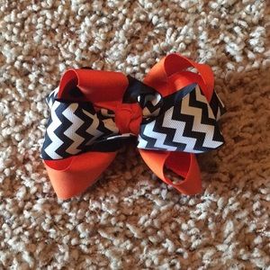 Orange, black and white hair bow